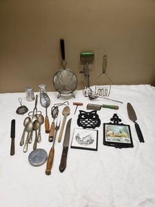 Collection of Vintage Kitchen Utensils and Gadgets and Trivets