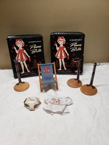 The Wonderful World of Penny Brite Dolls and Items including Cases, Stands, Clothes, and Accessories