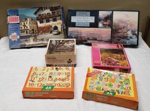 Various Jigsaw Puzzles Including Thomas Kinkade, Tuco Jumbo, and Whitman Deluxe Guild