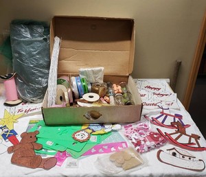 Craft Supplies and Decorations Lot including Ribbons, Stencils, and Cutouts