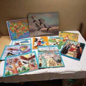 Various Childrens Puzzles Including Picture Puzzles, Disney, and Landmark Themes
