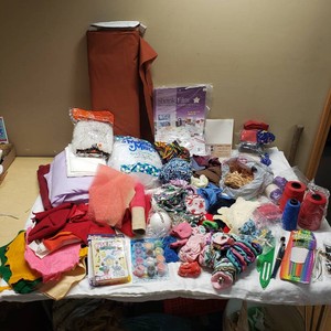 Assorted Craft Supplies including Fabrics, Shrink Film, and Art Materials