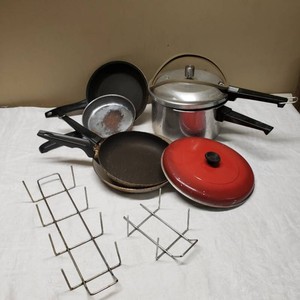 Set of  Cookware Pieces including Mirro Pressure Cooker, Frying Pans, and Wire Lid Racks