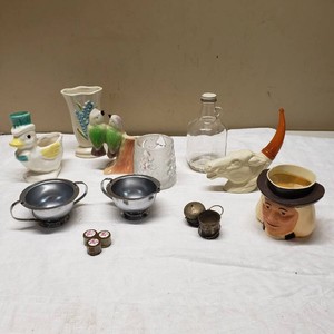 Vintage Ceramic Figurines and Collectibles including Avon Wild Mustang Pipe Cologne, Duck Planter, Bird Vase, and Silverware