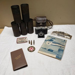 United States Army Memorabilia Collection including Agfa Jsolette Camera, Telephone Directory, and Smoke Grenade Containers, Vintage Photographs