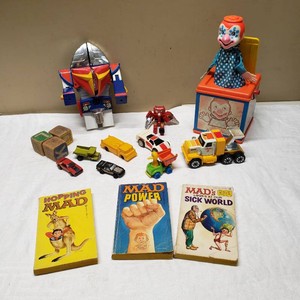 Vintage Toys and Books Collection including Tonka Cars, Jack-in-the-Box, and Mad Books