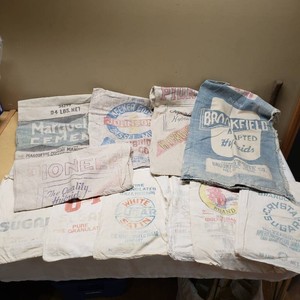 Vintage Seed and Sugar Sack Collection, Including Pioneer Hybrid Seed Corn, White Satin Sugar, and Marquette Cement Sacks