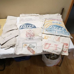 Set of Vintage Grain and Feed Bags Including Larro and Pioneer Bags, Chippewa Salt Bag, and More - Some May Not be Whole