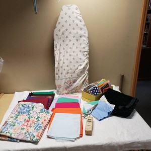 Vintage Ironing Board with Fabric Lot and Accessories including Sears Seam Sealer, Scissors, and Assorted Fabrics