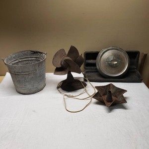 Galvanized Bucket, Montgomery Ward Fan, Star-Shaped Cake Pan, and Hubcap