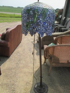 Freestanding lamp with heavy base a...