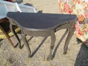 Abstract clawfoot style entry table...