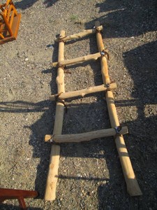 Creative Wood ladder prop with tied...