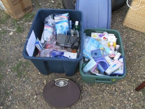 (2) storage totes containing a wide...