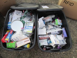 (2) covered totes containing person...