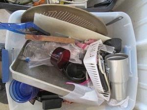Covered Tote with kitchen supplies,...
