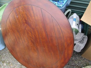 Round wood and nailhead a cent tabl...