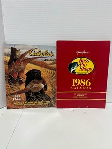 1986 Bass Pro Shops Catalog and 2989 Cabelas 1989 Fall HuntingFishing Catalog