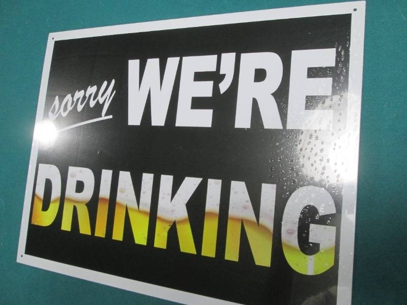 Drining metal sign measures 12 x 16...