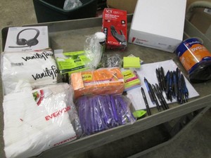 Assorted office and commercial supplies, postits, pens, DVD-R, USB headset and more