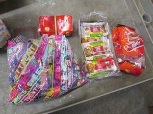 Assortment of candy, bars and tea