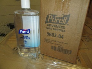 4 33.8 OZ Purell hand sanitizer