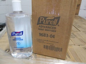 4 33.8 OZ Purell hand sanitizer