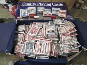 Box filled with mew decks of playing cards