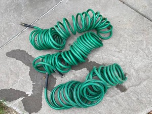 Coiled Garden Hoses, 3 Total