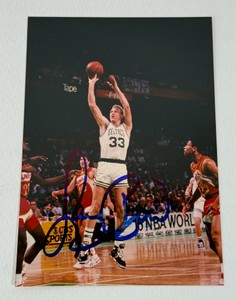 Larry Bird autographed basketball photo with JSA authentication