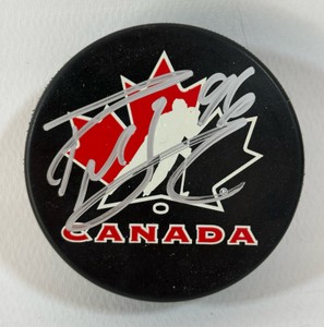 Pierre Marc-Bouchard autographed Team Canada hockey puck with JSA authentication, Minnesota Wild