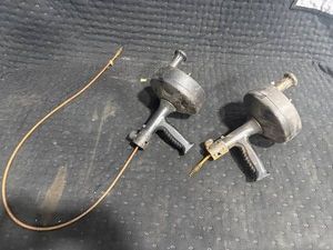 Two Manual Drain Augers