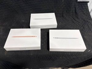 Three Apple MacBook Air Laptops