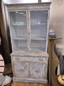 Two piece distressed wooden China cabinet and buffet