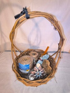 Arts and crafts items in a wicker basket