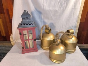 Candle lantern and 3 gold decorative cowbells