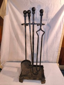 Antique cast-iron fireplace tool set