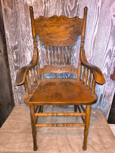 Vintage carved oak press-back armchair