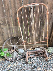 Wagon wheel, push reel mower, metal headboard