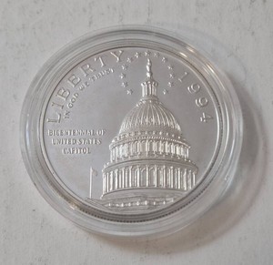 1994 Silver One Dollar Round - US Proof  commemorating the 200th anniversary of the US Capitol .   (1 Oz. round90% Silver)