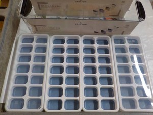 4 Ice Cube Trays and Refrigeration Bin