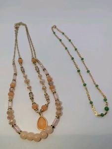 Pair of vintage necklaces- 1928 Jewelry Company peach layered beaded necklace, vibrant green beaded gold tone