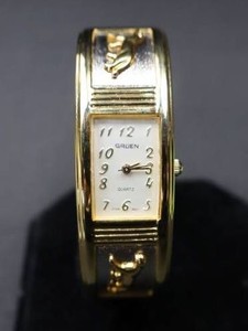 Vintage Gruen Hinged Cuff Watch with Raised Panther Accents