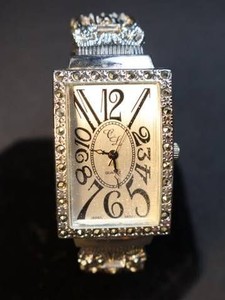 Vintage Ornate Quartz Cuff Watch with Whimsical Face