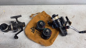 Pair of spin cast reels