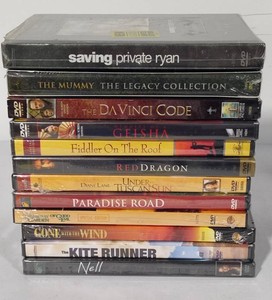 Stack of DVD Movies Unopened in Original Packaging
