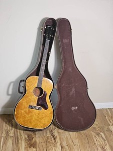 Vintage Harmony Four String Acoustic Guitar with Hard Case