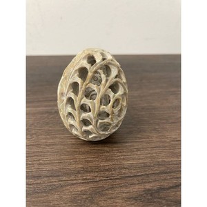 Carved Stone Egg Sculpture with Openwork Floral Pattern