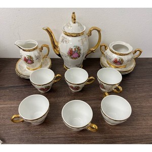 Striking China White Porcelain Tea Set with Gold Trim, 11 Pieces