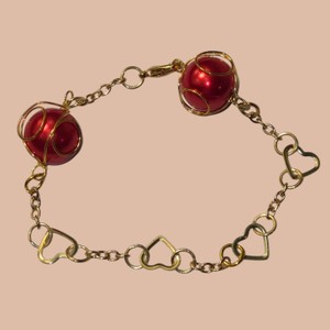 Gold-Tone Heart Link Bracelet with Red Caged Beads